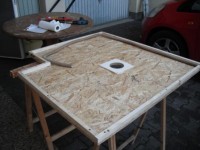Holzpallte mit Rahmen an der Unterseite